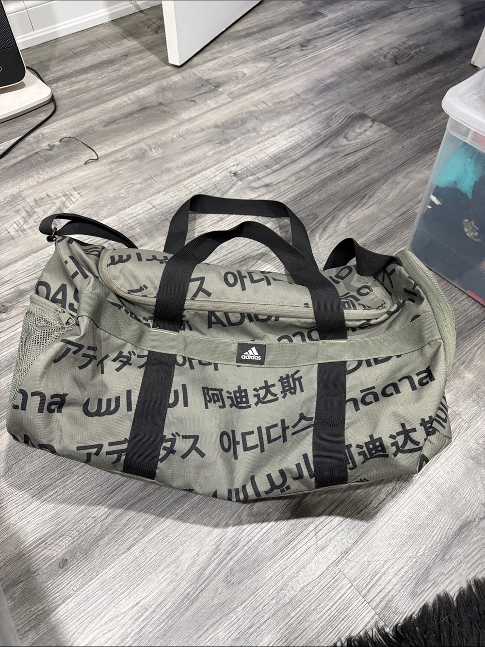 adidas Olive Green Duffel with Black Straps and Multilingual Print